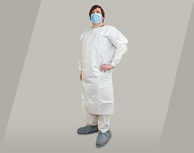 Man in a white Kappler ProVent Berry Compliant gown, surgical mask and boot covers